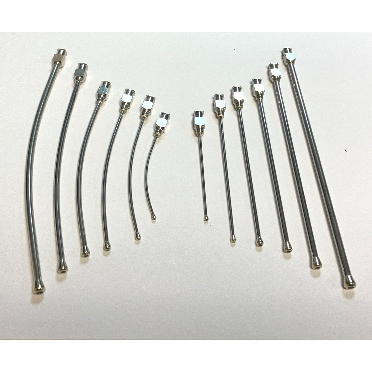 A group of curved and straight gavage tubes