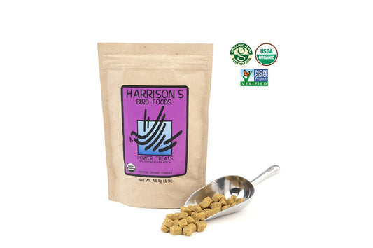 A 454g bag of Harrison's Power Treats, next to a metal scoop full of the nuggets